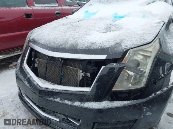 ✅ 2013 Cadillac SRX Luxury Collection • VIN: 3GYFNCE31DS561770 • Lot: 44183728. Wystawiony na IAAI z przebiegiem 158 482 mil. Bezpłatny archiwum sprzedaży aukcyjnych z USA i szczegółowy raport historii pojazdu na DreamBid. Zdjęcie 6.