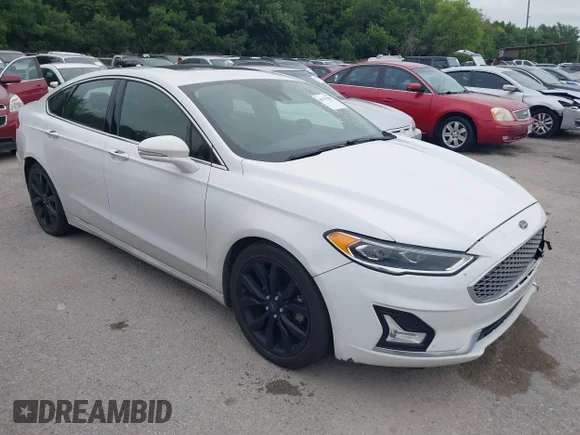 ✅ 2019 Ford Fusion Titanium • VIN: 3FA6P0D99KR263594 • Lot: 45379282. Wystawiony na IAAI z przebiegiem 194 821 mil. Bezpłatny archiwum sprzedaży aukcyjnych z USA i szczegółowy raport historii pojazdu na DreamBid. Zdjęcie 1.