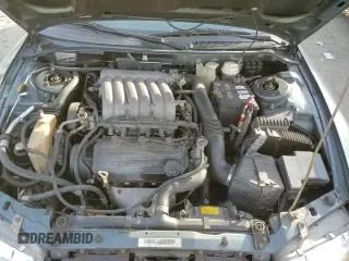 ✅ 2000 Chrysler Sebring LXi • VIN: 4C3AU52N1YE080294 • Lot: 85272304. Listed on Copart with 75,113 mi. Free auction sales archive from the USA and detailed vehicle history report at DreamBid. Image 13.