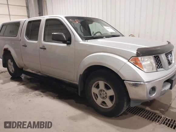 ✅ 2007 Nissan Frontier SE • VIN: 1N6AD09W37C461327 • Lot: 43408790. Listed on IAAI with 233,101 mi. Free auction sales archive from the USA and detailed vehicle history report at DreamBid. Image 1.