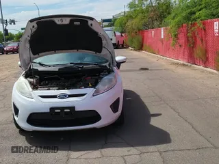 ✅ 2013 Ford Fiesta SE • VIN: 3FADP4EJ2DM109977 • Лот: 70983515. Опубликован ранее на Copart с пробегом 71 507 миль. Бесплатный доступ к архиву аукционных продаж из США и подробный отчёт об истории автомобиля на DreamBid. Изображение 11.