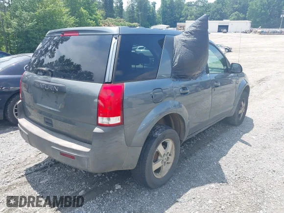✅ 2005 Saturn VUE • VIN: 5GZCZ53465S841863 • Lot: 42466940. Listed on IAAI with 314,934 mi. Free auction sales archive from the USA and detailed vehicle history report at DreamBid. Image 4.