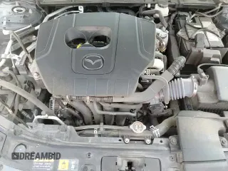 ✅ 2023 Mazda 3 S Carbon Edition • VIN: 3MZBPBCM4PM360097 • Лот: 72000575. Опубликован ранее на Copart с пробегом 54 511 миль. Бесплатный доступ к архиву аукционных продаж из США и подробный отчёт об истории автомобиля на DreamBid. Изображение 14.