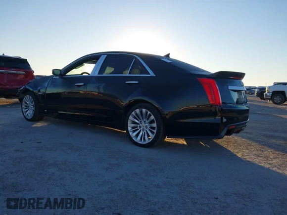 ✅ 2014 Cadillac CTS Performance RWD • VIN: 1G6AS5SX0E0141327 • Lot: 43621709. Listed on IAAI with 175,964 mi. Free auction sales archive from the USA and detailed vehicle history report at DreamBid. Image 3.