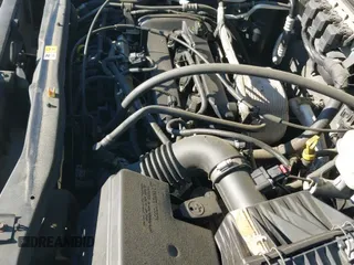 ✅ 2005 Mazda Tribute i • VIN: 4F2YZ02Z65KM48274 • Lot: 43129870. Listed on IAAI with 144,826 mi. Free auction sales archive from the USA and detailed vehicle history report at DreamBid. Image 14.