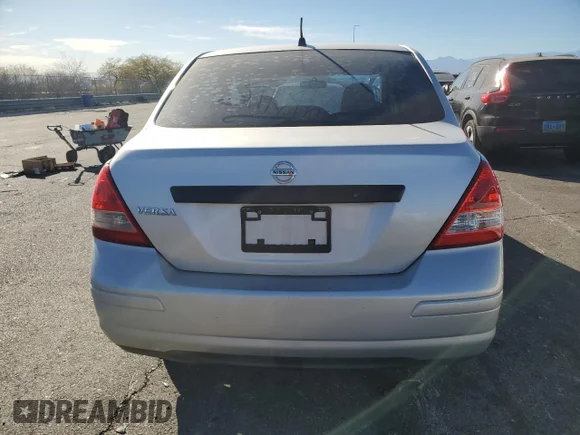 ✅ 2009 Nissan Versa 1.6 Base • VIN: 3N1CC11E49L425101 • Лот: 87758955. Опубліковано раніше на Copart з пробігом 256 048 миль. Безкоштовний доступ до архіву аукціонних продажів зі США та докладний звіт про історію автомобіля на DreamBid. Зображення 6.