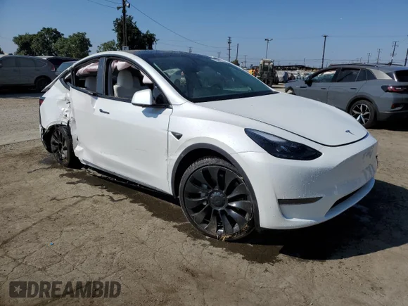 ✅ 2024 Tesla Model Y • VIN: 7SAYGDED1RF104449 • Lot: 73021784. Listed on Copart with 6,587 mi. Free auction sales archive from the USA and detailed vehicle history report at DreamBid. Image 4.