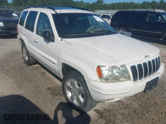 ✅ 2001 Jeep Grand Cherokee Limited • VIN: 1J4GX58S11C571004 • Lot: 43261170. Listed on IAAI with 205,370 mi. Free auction sales archive from the USA and detailed vehicle history report at DreamBid. Image 1.