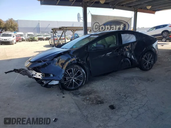 ✅ 2024 Toyota Prius XLE • VIN: JTDACAAU1R3040070 • Лот: 51348816. Опубліковано раніше на Copart з пробігом 30 551 миль. Безкоштовний доступ до архіву аукціонних продажів зі США та докладний звіт про історію автомобіля на DreamBid. Зображення 1.