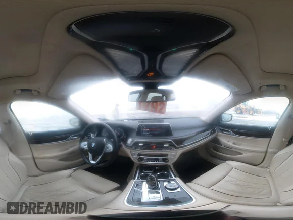 ✅ 2016 BMW 7 Series 750i xDrive • VIN: WBA7F2C51GG420333 • Lot: 44031223. Listed on IAAI with 54,201 mi. Free auction sales archive from the USA and detailed vehicle history report at DreamBid. Image 18.