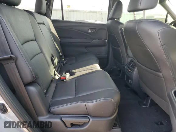 ✅ 2021 Honda Passport Elite • VIN: 5FNYF8H07MB029247 • Lot: 71735125. Wystawiony na Copart z przebiegiem 61 783 mil. Bezpłatny archiwum sprzedaży aukcyjnych z USA i szczegółowy raport historii pojazdu na DreamBid. Zdjęcie 11.