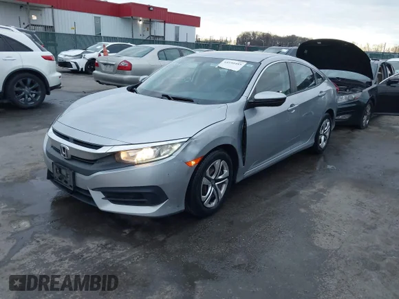 ✅ 2016 Honda Civic LX • VIN: 19XFC2F57GE211486 • Lot: 44190485. Wystawiony na IAAI z przebiegiem 73 822 mil. Bezpłatny archiwum sprzedaży aukcyjnych z USA i szczegółowy raport historii pojazdu na DreamBid. Zdjęcie 2.