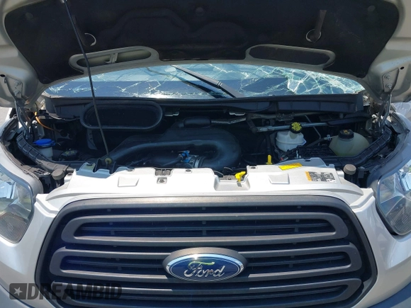 ✅ 2019 Ford Transit Cargo • VIN: 1FTYE2YM9KKA50345 • Lot: 42673388. Wystawiony na IAAI z przebiegiem 121 002 mil. Bezpłatny archiwum sprzedaży aukcyjnych z USA i szczegółowy raport historii pojazdu na DreamBid. Zdjęcie 10.