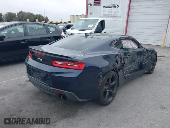 ✅ 2016 Chevrolet Camaro 2LT • VIN: 1G1FD1RXXG0162676 • Lot: 42419935. Listed on IAAI with 63,336 mi. Free auction sales archive from the USA and detailed vehicle history report at DreamBid. Image 4.