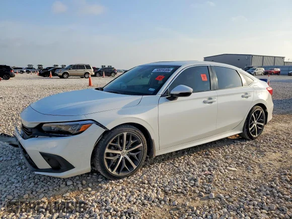✅ 2024 Honda Civic Touring • VIN: 2HGFE1F99RH303165 • Lot: 50059306. Listed on Copart with 62,987 mi. Free auction sales archive from the USA and detailed vehicle history report at DreamBid. Image 1.
