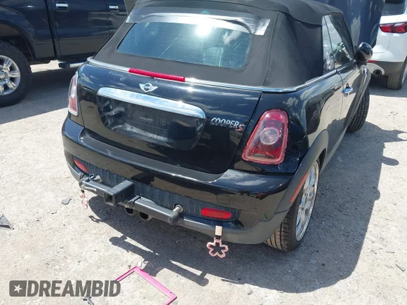 ✅ 2009 MINI Convertible S • VIN: WMWMS335X9TY07543 • Lot: 45337413. Listed on IAAI with 120,989 mi. Free auction sales archive from the USA and detailed vehicle history report at DreamBid. Image 6.