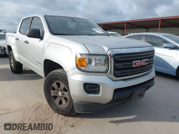 ✅ 2018 GMC Canyon 2WD • VIN: 1GTG5BEN5J1102843 • Lot: 45121101. Listed on IAAI with 137,039 mi. Free auction sales archive from the USA and detailed vehicle history report at DreamBid. Image 1.