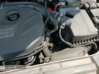 ✅ 2018 Lincoln MKZ Premiere • VIN: 3LN6L5B90JR601352 • Лот: 54317225. Опубликован ранее на Copart с пробегом 76 054 миль. Бесплатный доступ к архиву аукционных продаж из США и подробный отчёт об истории автомобиля на DreamBid. Изображение 13.