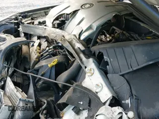 ✅ 2004 Cadillac DeVille • VIN: 1G6KD54Y04U255467 • Lot: 43256886. Listed on IAAI with 127,905 mi. Free auction sales archive from the USA and detailed vehicle history report at DreamBid. Image 12.