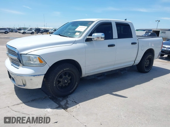 ✅ 2015 Ram 1500 Laramie • VIN: 1C6RR6NT9FS582526 • Lot: 45022335. Wystawiony na IAAI z przebiegiem 311 948 mil. Bezpłatny archiwum sprzedaży aukcyjnych z USA i szczegółowy raport historii pojazdu na DreamBid. Zdjęcie 2.