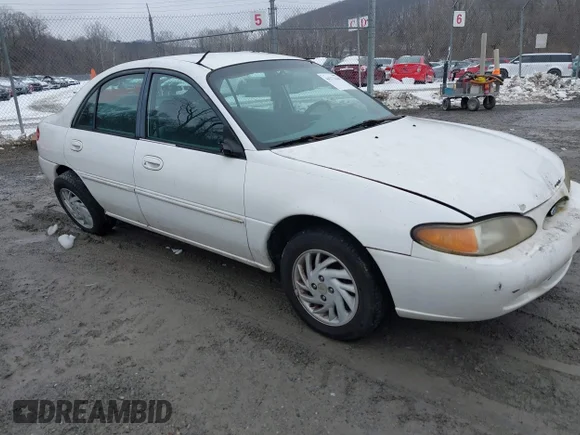 ✅ 1997 Ford Escort LX • VIN: 1FALP13P6VW409525 • Lot: 44271448. Listed on IAAI with 138,369 mi. Free auction sales archive from the USA and detailed vehicle history report at DreamBid. Image 1.