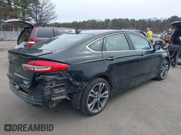 ✅ 2020 Ford Fusion Titanium • VIN: 3FA6P0K95LR173945 • Lot: 44605909. Wystawiony na IAAI z przebiegiem 162 505 mil. Bezpłatny archiwum sprzedaży aukcyjnych z USA i szczegółowy raport historii pojazdu na DreamBid. Zdjęcie 4.