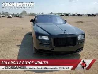 ✅ 2014 Rolls-Royce Wraith • VIN: SCA665C5XEUX84725 • Lot: 69384165. Wystawiony na Copart z przebiegiem 36 766 mil. Bezpłatny archiwum sprzedaży aukcyjnych z USA i szczegółowy raport historii pojazdu na DreamBid. Zdjęcie 16.