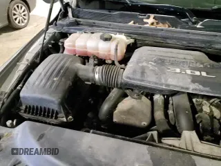 ✅ 2022 Ram 1500 Laramie • VIN: 1C6SRFJM3NN478000 • Lot: 50243465. Listed on Copart with 70,703 mi. Free auction sales archive from the USA and detailed vehicle history report at DreamBid. Image 13.