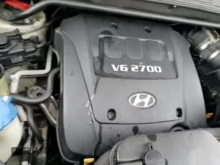 2007 Hyundai Tucson SE z VIN KM8JN12D47U587233, wystawiony jako Copart lot #84651284 z przebiegiem 187 310 mil mil oraz Szkoda całkowita • Salvage title. Historia ofert i sprzedaży dostępna na DreamBid. Obrazek 14.