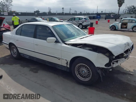 ✅ 1998 BMW 7 Series 740iL • VIN: WBAGJ8324WDM11763 • Лот: 43382358. Опубликован ранее на IAAI с пробегом 194 949 миль. Бесплатный доступ к архиву аукционных продаж из США и подробный отчёт об истории автомобиля на DreamBid. Изображение 1.