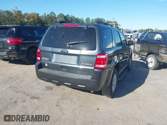 ✅ 2010 Ford Escape Hybrid • VIN: 1FMCU4K31AKA36281 • Lot: 43414386. Wystawiony na IAAI z przebiegiem 283 671 mil. Bezpłatny archiwum sprzedaży aukcyjnych z USA i szczegółowy raport historii pojazdu na DreamBid. Zdjęcie 4.