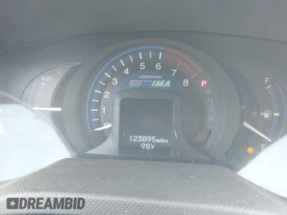 ✅ 2014 Honda Insight EX • VIN: JHMZE2H72ES001084 • Лот: 42596238. Опубліковано раніше на IAAI з пробігом 123 895 миль. Безкоштовний доступ до архіву аукціонних продажів зі США та докладний звіт про історію автомобіля на DreamBid. Зображення 7.