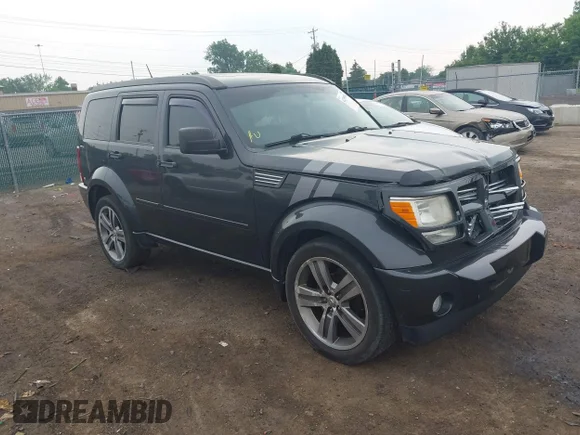 ✅ 2011 Dodge Nitro Shock • VIN: 1D4PU7GX2BW576660 • Lot: 42359356. Listed on IAAI with 146,044 mi. Free auction sales archive from the USA and detailed vehicle history report at DreamBid. Image 1.