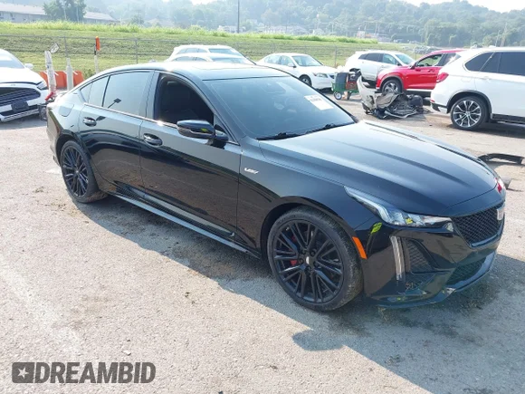 ✅ 2023 Cadillac CT5-V • VIN: 1G6DV5RW7P0138266 • Lot: 42886785. Listed on IAAI with 18,568 mi. Free auction sales archive from the USA and detailed vehicle history report at DreamBid. Image 1.