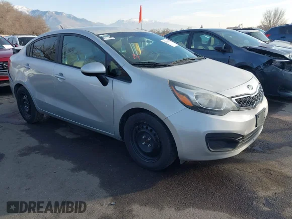 ✅ 2014 Kia Rio SX • VIN: KNADN4A32E6413414 • Lot: 44047768. Listed on IAAI with 123,883 mi. Free auction sales archive from the USA and detailed vehicle history report at DreamBid. Image 1.