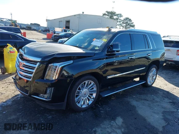 ✅ 2015 Cadillac Escalade Platinum • VIN: 1GYS4PKJ6FR677189 • Lot: 44161521. Wystawiony na IAAI z przebiegiem 180 796 mil. Bezpłatny archiwum sprzedaży aukcyjnych z USA i szczegółowy raport historii pojazdu na DreamBid. Zdjęcie 2.