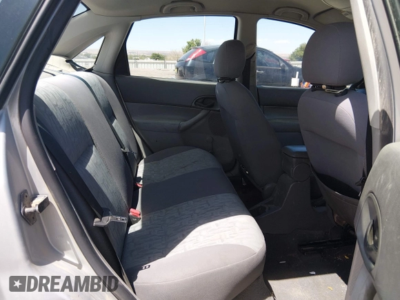 ✅ 2005 Ford Focus S • VIN: 1FAFP34N65W298013 • Lot: 44893900. Wystawiony na IAAI z przebiegiem 218 288 mil. Bezpłatny archiwum sprzedaży aukcyjnych z USA i szczegółowy raport historii pojazdu na DreamBid. Zdjęcie 8.