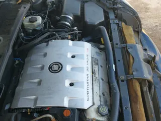 ✅ 2000 Cadillac DeVille DHS • VIN: 1G6KE57Y3YU338809 • Lot: 41473488. Wystawiony na IAAI z przebiegiem 178 408 mil. Bezpłatny archiwum sprzedaży aukcyjnych z USA i szczegółowy raport historii pojazdu na DreamBid. Zdjęcie 24.