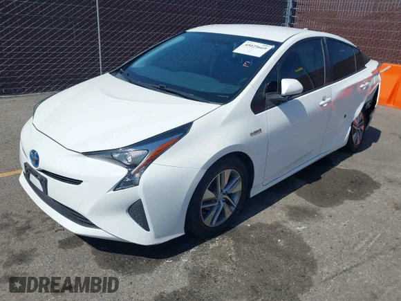 ✅ 2016 Toyota Prius Two • VIN: JTDKBRFU2G3517178 • Lot: 45025669. Wystawiony na IAAI z przebiegiem 143 528 mil. Bezpłatny archiwum sprzedaży aukcyjnych z USA i szczegółowy raport historii pojazdu na DreamBid. Zdjęcie 2.