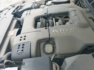 ✅ 1996 Lincoln Mark VIII • VIN: 1LNLM91VXTY682127 • Lot: 41913767. Wystawiony na IAAI z przebiegiem 97 397 mil. Bezpłatny archiwum sprzedaży aukcyjnych z USA i szczegółowy raport historii pojazdu na DreamBid. Zdjęcie 14.