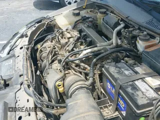 ✅ 2003 Ford Focus • VIN: 1FAHP34Z43W284930 • Lot: 42152784. Listed on IAAI with 165,769 mi. Free auction sales archive from the USA and detailed vehicle history report at DreamBid. Image 12.