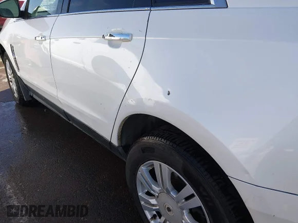 ✅ 2011 Cadillac SRX • VIN: 3GYFNGEY4BS590311 • Lot: 44193419. Listed on IAAI with 202,475 mi. Free auction sales archive from the USA and detailed vehicle history report at DreamBid. Image 6.