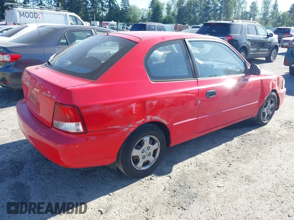 ✅ 2002 Hyundai Accent GS • VIN: KMHCG35C32U232371 • Lot: 42602297. Wystawiony na IAAI z przebiegiem 113 904 mil. Bezpłatny archiwum sprzedaży aukcyjnych z USA i szczegółowy raport historii pojazdu na DreamBid. Zdjęcie 4.