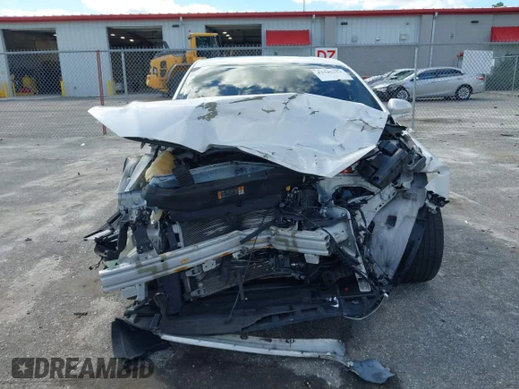 ✅ 2015 Ford Fusion Titanium Hybrid • VIN: 3FA6P0RU8FR123653 • Lot: 43445753. Wystawiony na IAAI z przebiegiem 97 875 mil. Bezpłatny archiwum sprzedaży aukcyjnych z USA i szczegółowy raport historii pojazdu na DreamBid. Zdjęcie 6.