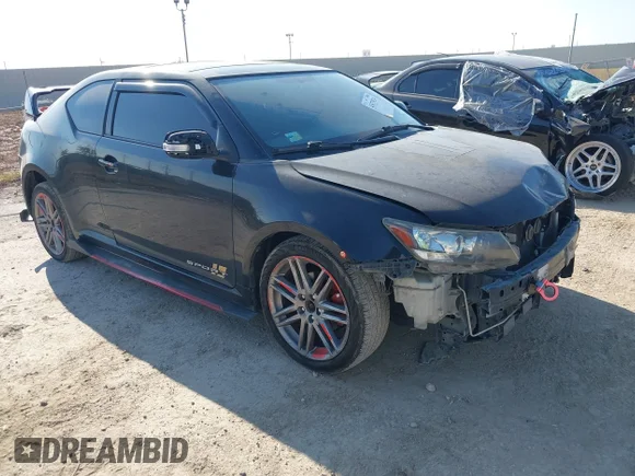 ✅ 2012 Scion tC • VIN: JTKJF5C77C3041262 • Lot: 43471824. Wystawiony na IAAI z przebiegiem 198 229 mil. Bezpłatny archiwum sprzedaży aukcyjnych z USA i szczegółowy raport historii pojazdu na DreamBid. Zdjęcie 1.