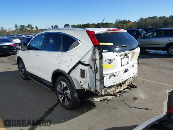 ✅ 2015 Honda CR-V Touring • VIN: 5J6RM3H93FL019319 • Lot: 44593409. Wystawiony na IAAI z przebiegiem 81 961 mil. Bezpłatny archiwum sprzedaży aukcyjnych z USA i szczegółowy raport historii pojazdu na DreamBid. Zdjęcie 3.
