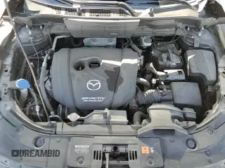 ✅ 2018 Mazda CX-5 Touring • VIN: JM3KFACM0J0310119 • Lot: 87260445. Wystawiony na Copart z przebiegiem 137 160 mil. Bezpłatny archiwum sprzedaży aukcyjnych z USA i szczegółowy raport historii pojazdu na DreamBid. Zdjęcie 14.