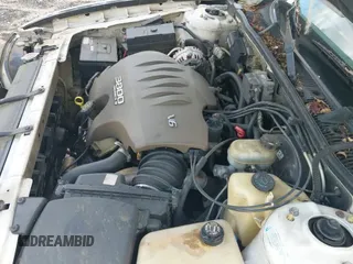 ✅ 2000 Buick Park Avenue • VIN: 1G4CW52K2Y4134144 • Лот: 42795002. Опубликован ранее на IAAI с пробегом Не указан. Бесплатный доступ к архиву аукционных продаж из США и подробный отчёт об истории автомобиля на DreamBid. Изображение 12.