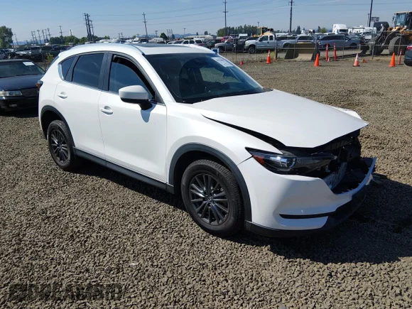 ✅ 2020 Mazda CX-5 Touring • VIN: JM3KFACM0L1815378 • Lot: 45378645. Wystawiony na IAAI z przebiegiem 94 111 mil. Bezpłatny archiwum sprzedaży aukcyjnych z USA i szczegółowy raport historii pojazdu na DreamBid. Zdjęcie 1.