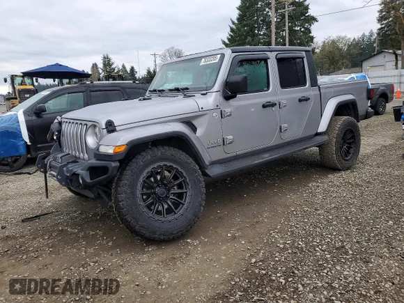 ✅ 2020 Jeep Gladiator Overland • VIN: 1C6HJTFG1LL129431 • Lot: 78333205. Listed on Copart with 67,879 mi. Free auction sales archive from the USA and detailed vehicle history report at DreamBid. Image 1.
